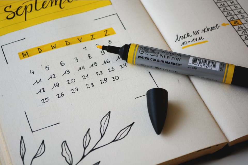 Calendar and highlighter pen, by Estee Janssens